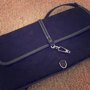 Authentic coach clutch